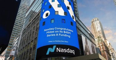 The logo of Midas is pictured on the display outside the Nasdaq Market Site in Times Square after the company’s $45 million Series A funding round in New York, U.S., April 22, 2024. (DHA Photo)