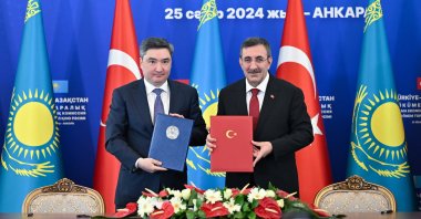 Vice President Cevdet Yılmaz (R) and Kazakh Prime Minister Oljas Bektenov after a signing ceremony in Ankara, Türkiye, April 25, 2024. (AA Photo)