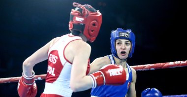 Turkish boxer Buse Naz Çakıroğlu (R) punches her Russian opponent Anastasiia Kool during the European Boxing Championships, Belgrade, Serbia, April 27, 2024. (AA Photo) 