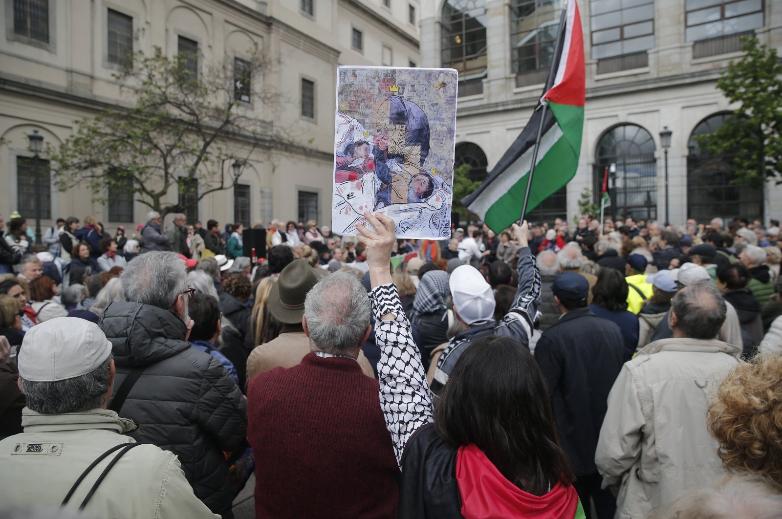 A prominent group of artists and intellectuals gathered in front of Reina Sofia Museum to express support for Palestine and say &quot;no&quot; to genocide and terrorism, Madrid, Spain, April 26, 2024. (AA Photo)
