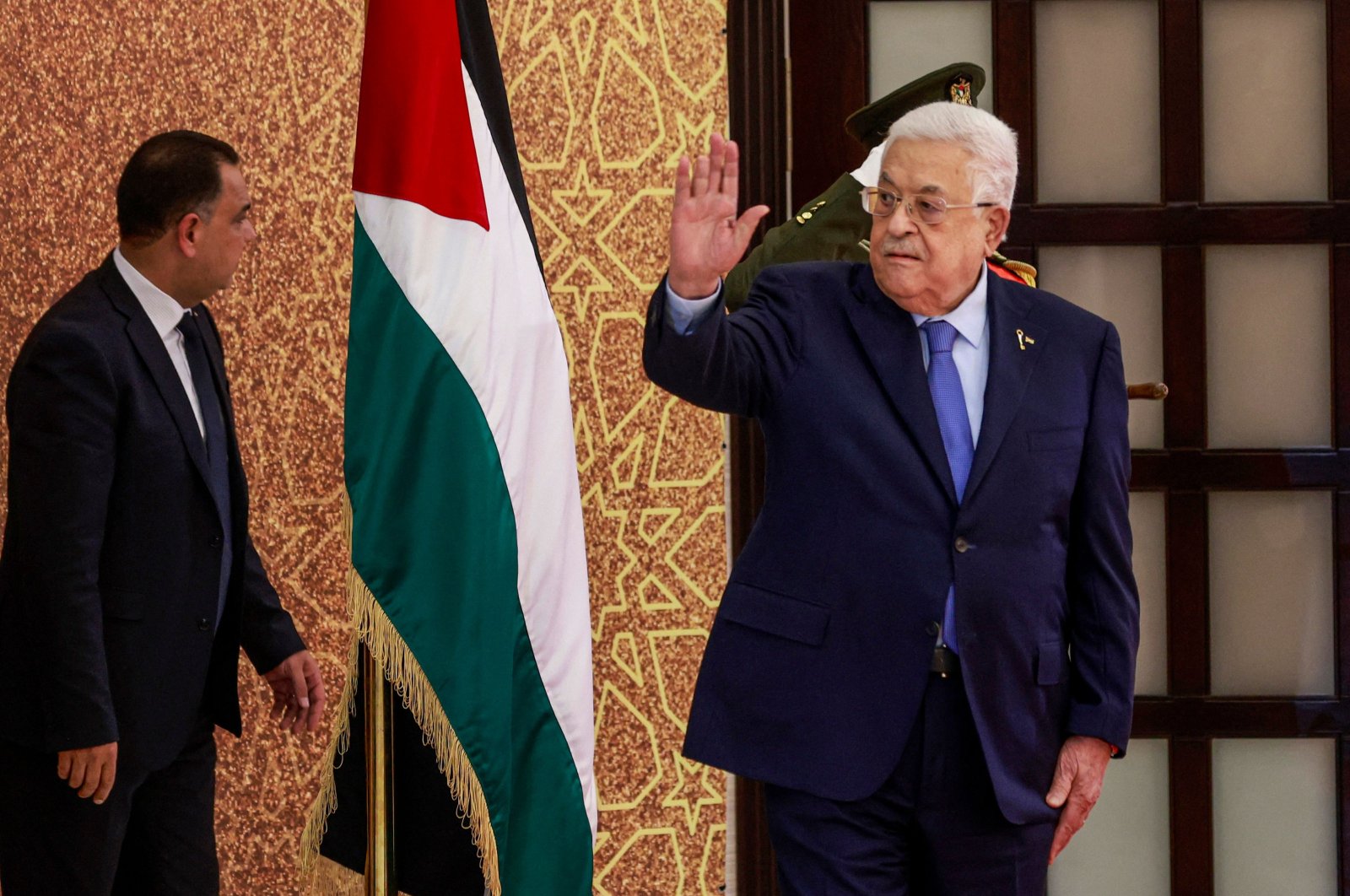 Palestinian President Mahmud Abbas waves during a swearing in ceremony of newly appointed ministers, in Ramallah, occupied West Bank, Palestine, March 31, 2024. (AFP Photo)