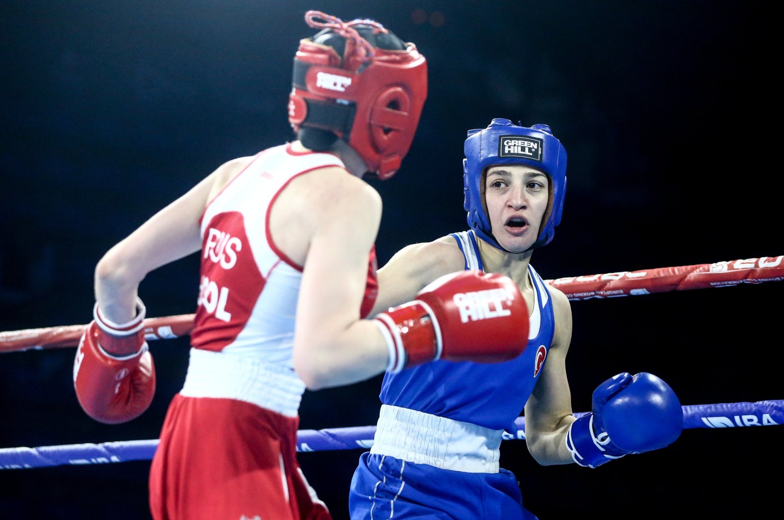 Turkish boxer Buse Naz Çakıroğlu (R) punches her Russian opponent Anastasiia Kool during the European Boxing Championships, Belgrade, Serbia, April 27, 2024. (AA Photo) 