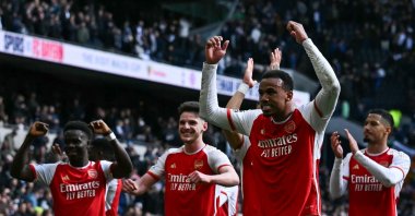 Arsenal&#039;s Gabriel Magalhaes (C) celebrates with teammates at the end of during the English Premier League football match against Tottenham Hotspur at the Tottenham Hotspur Stadium, London, U.K., April 28, 2024. (AFP Photo)