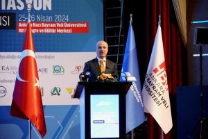 YÖK President Erol Özvar delivers a speech at the "International Quality Assurance and Accreditation Conference," Ankara, Türkiye, April 29, 2024. (IHA Photo)