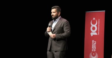 Daily Sabah Newspaper Editor-in-Chief Ibrahim Altay speaks during the event. (Twitter / YEE)