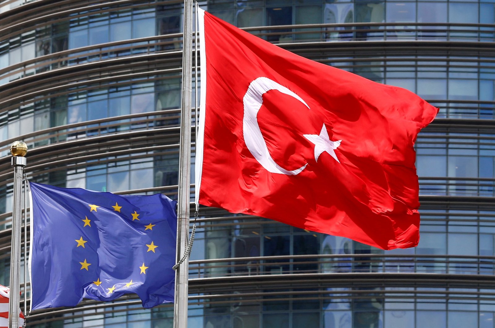 European Union (L) and Turkish flags fly outside a hotel, Istanbul, Türkiye, May 4, 2016. (Reuters Photo)