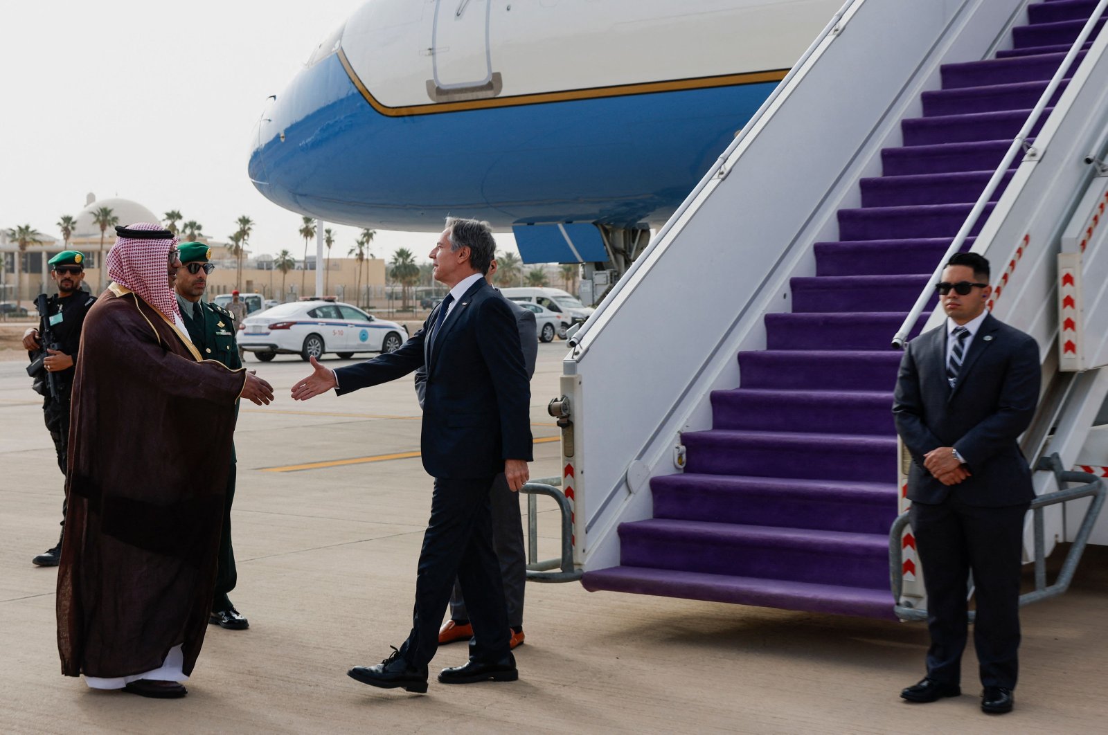 U.S. Secretary of State Antony Blinken (R) is welcomed by Saudi Foreign Ministry official Mohammed al-Ghamdi in Riyadh, Saudi Arabia, April 29, 2024. (AFP Photo)