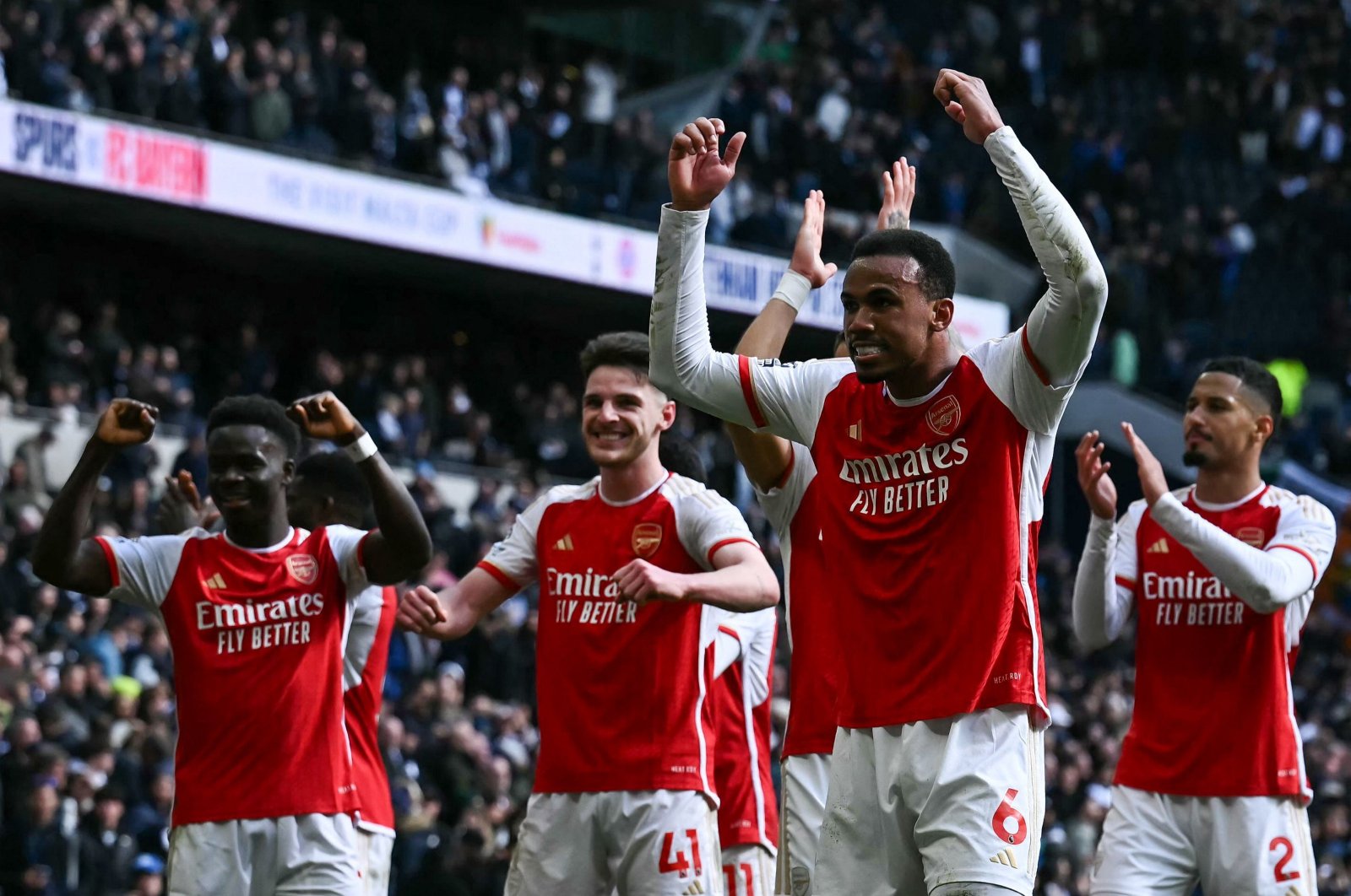 Arsenal&#039;s Gabriel Magalhaes (C) celebrates with teammates at the end of during the English Premier League football match against Tottenham Hotspur at the Tottenham Hotspur Stadium, London, U.K., April 28, 2024. (AFP Photo)