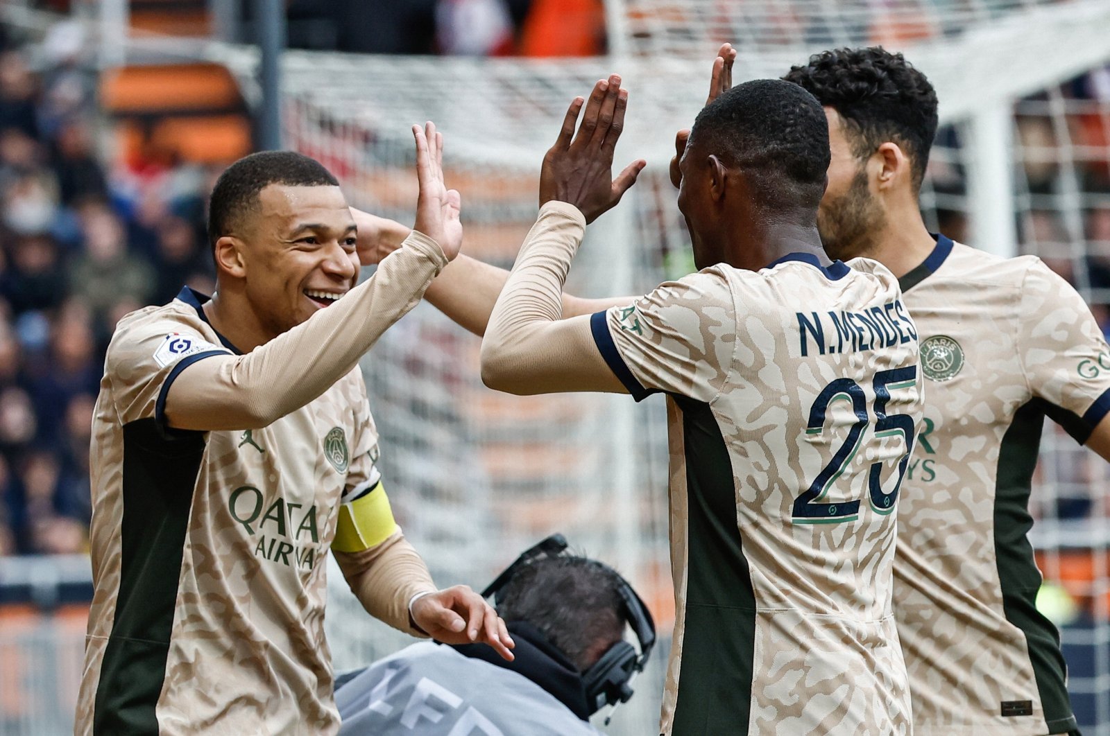 Kylian Mbappe (L) celebrates with teammates after scoring the 0-2 goal during the French Ligue 1 match against FC Lorient, Lorient, France, April 24, 2024. (EPA Photo)