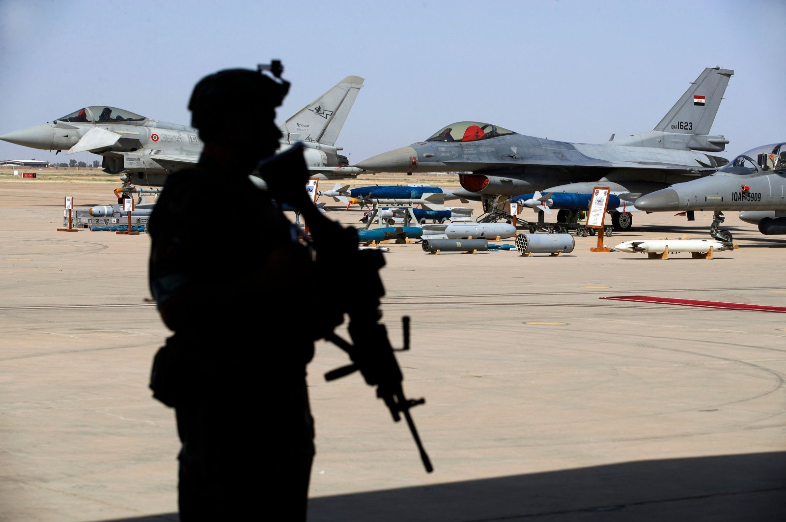 An Iraqi soldier stands guard an air show of military aircrafts at the Balad Air Base north of Baghdad, Iraq, April 24, 2024. (AFP Photo) 
