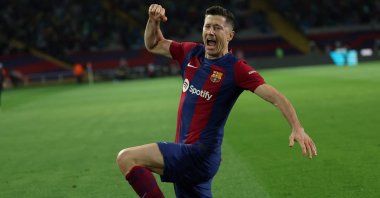 Barcelona's Robert Lewandowski celebrates after scoring his team's third goal during the La Liga match against Valencia at the Estadi Olimpic Lluis Companys, Barcelona, Spain, April 29, 2024. (AFP Photo)