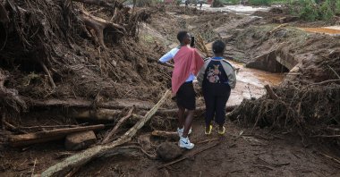 Local residents survey the damage after Old Kijabe Dam burst its banks in Mai Mahiu, Naivasha, Kenya, April 29, 2024.