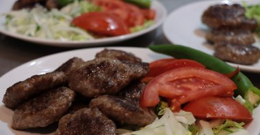 The research, conducted to analyze Türkiye's dining landscape in 2023, highlighted a consistent trend of using credit cards for dining out, with döner and köfte eateries ranking as the top choices for expenditure throughout the year. (AA Photo)