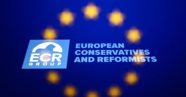 European Conservatives and Reformists Group logo displayed on a phone screen and European Union flag displayed on a laptop screen are seen in this multiple exposure illustration photo taken in Krakow, Poland on Aug. 25, 2022. (Reuters File Photo)