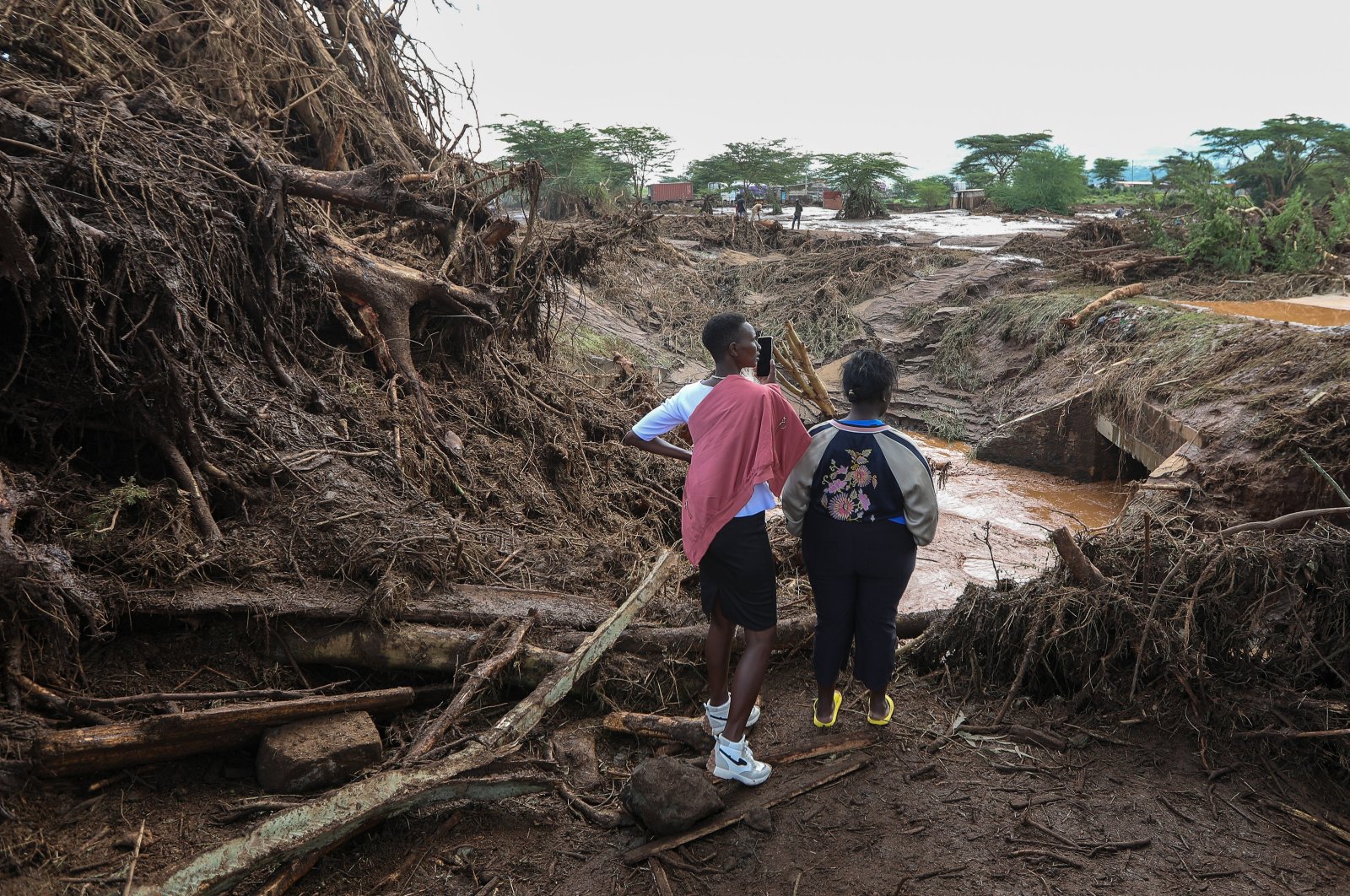 Local residents survey the damage after Old Kijabe Dam burst its banks in Mai Mahiu, Naivasha, Kenya, April 29, 2024.