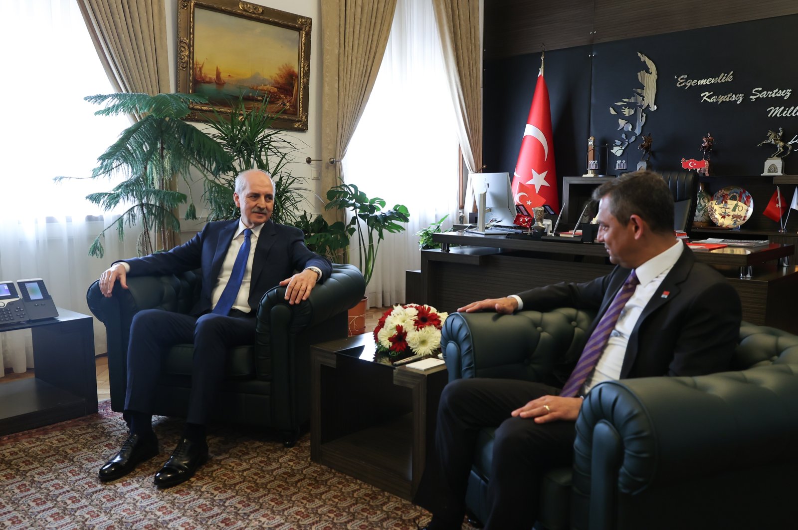 Parliament Speaker Numan Kurtulmuş (L) met Özgür Özel at Parliament in the capital Ankara, Türkiye, April 30, 2024. (DHA Photo)