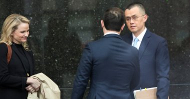 Former Binance CEO Changpeng &quot;CZ&quot; Zhao (R) arrives at federal court in Seattle, Washington, U.S., April 30, 2024. (AFP Photo)