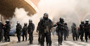 Police officers from the BRAV-M (Brigade of Repression of Motorized Violent Action) clash with protesters during the annual May Day march in Paris, France, May 1, 2024. (EPA Photo)
