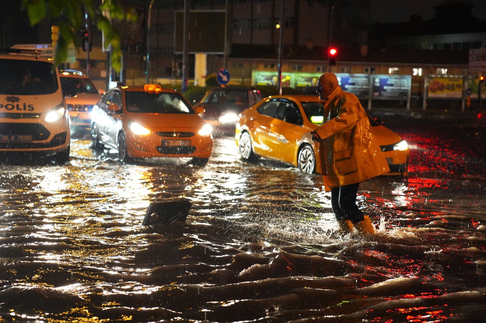 Heavy rain in the evening led to puddles forming in Sıhhıye, making it difficult for vehicles to move forward, Ankara, Türkiye. April, 30, 2024. (AA Photo) 