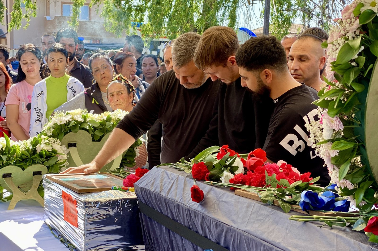 Mourners attend a funeral for four Bulgarian citizens of Turkish descent killed in a Solingen arson attack, southern Plovdiv, Bulgaria, April 4, 2024. (AA Photo)