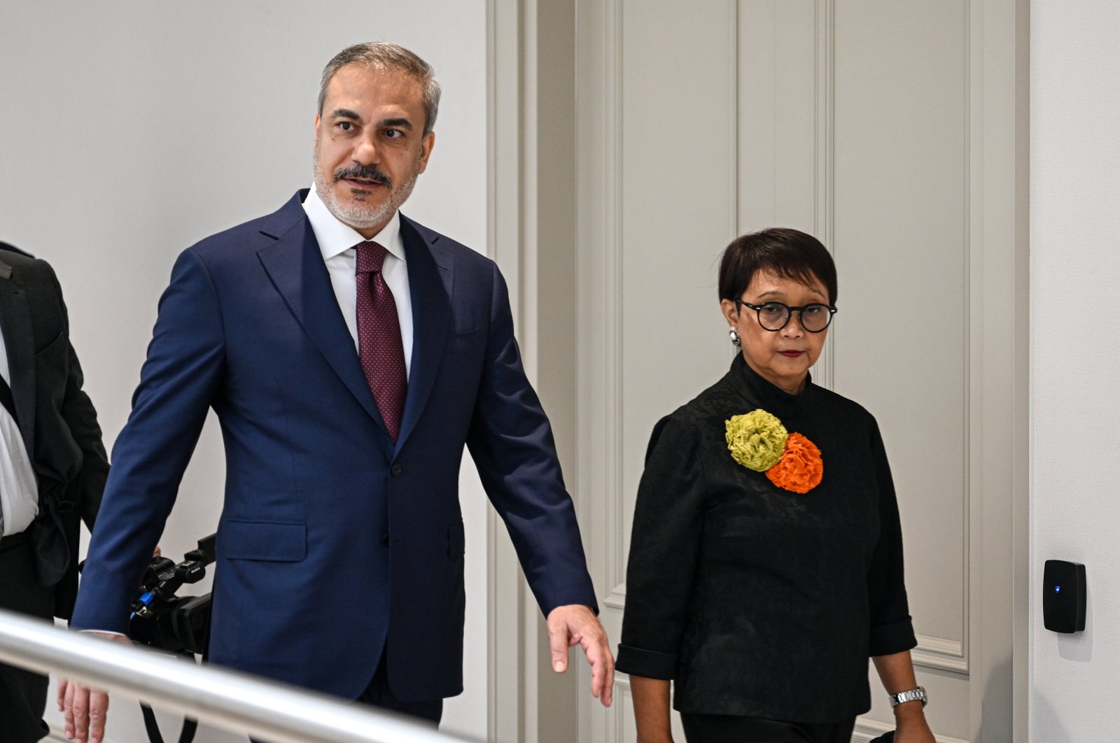 Foreign Minister Hakan Fidan (L) walks next to Indonesian Foreign Minister Retno Marsudi, Ankara, Türkiye, May 1, 2024. (AA Photo)