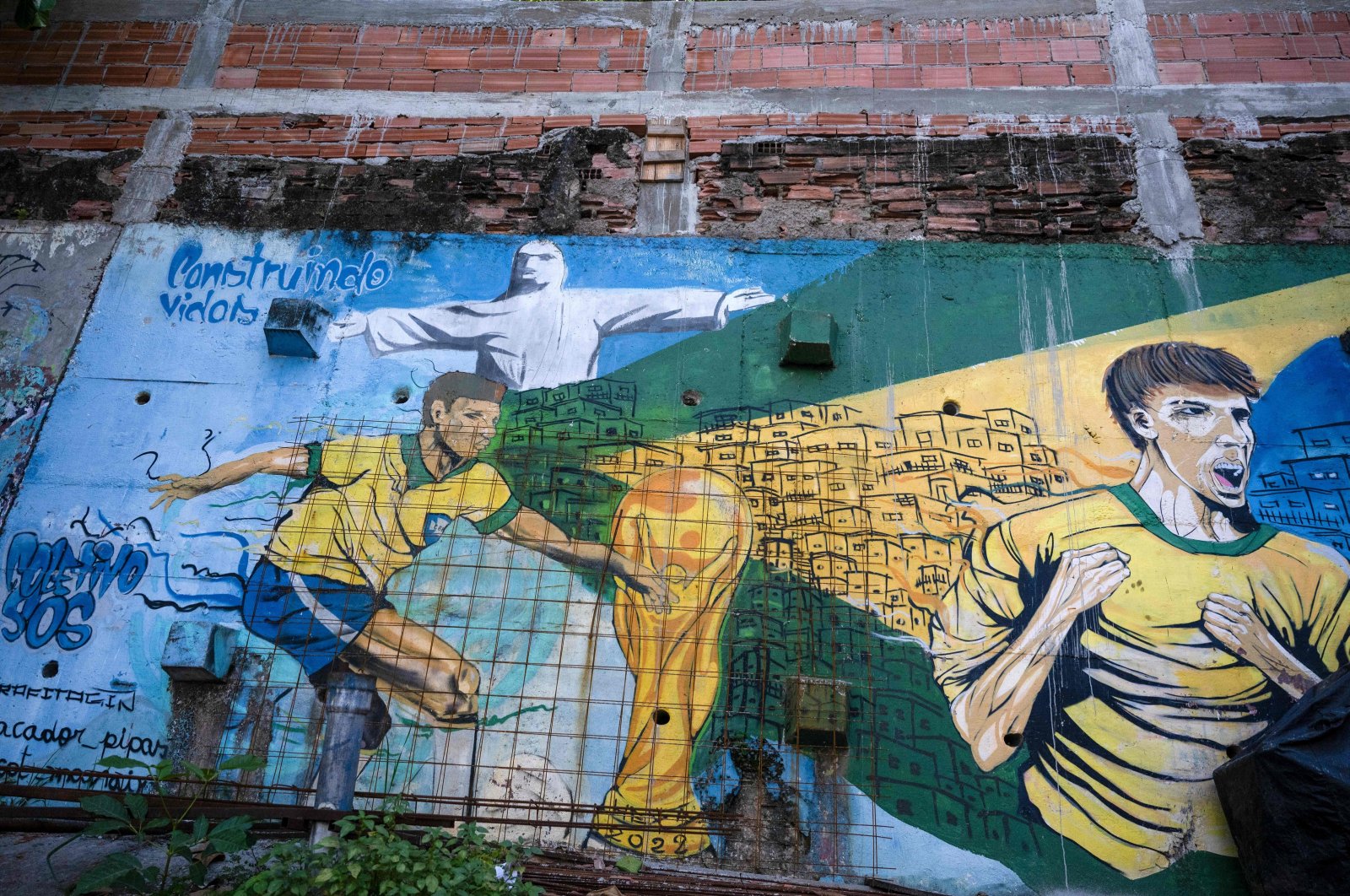 A mural painted in reference to Brazilian football is seen at the entrance of the Morro da Babilonia favela, Rio de Janeiro, Brazil, April 15, 2024. (AFP Photo)