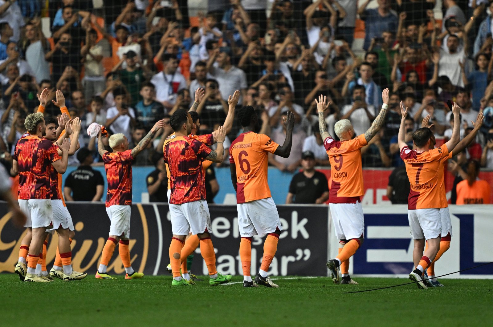 Galatasaray players wave at fans after the match against Adana Demirspor at the New Adana Stadium, Adana, Türkiye, April 26, 2024. (AA Photo)