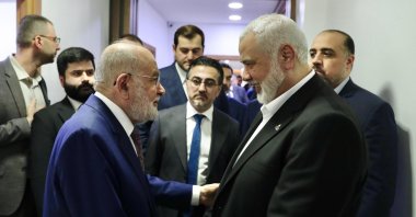 Felicity Party (SP) Chair Temel Karamollaoğlu (L) shakes hands with Ismail Haniyeh, Istanbul, Türkiye, May 3, 2024. (DHA Photo)