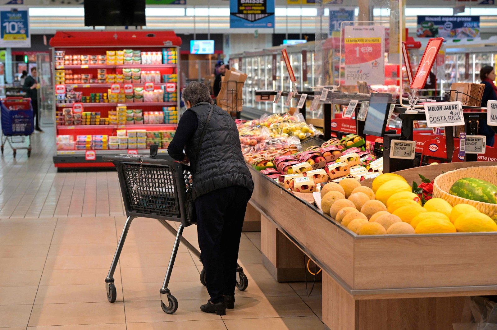 A customer shops at a supermarket in Pace, outside Rennes, France, April 26, 2024. (AFP Photo)