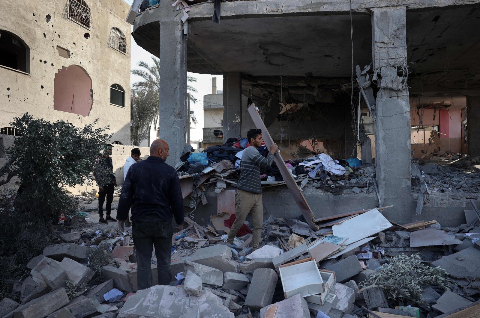 Palestinians check the damage in the aftermath of Israeli bombing, Rafah, Gaza Strip, Palestine, May 3, 2024. (AFP Photo)