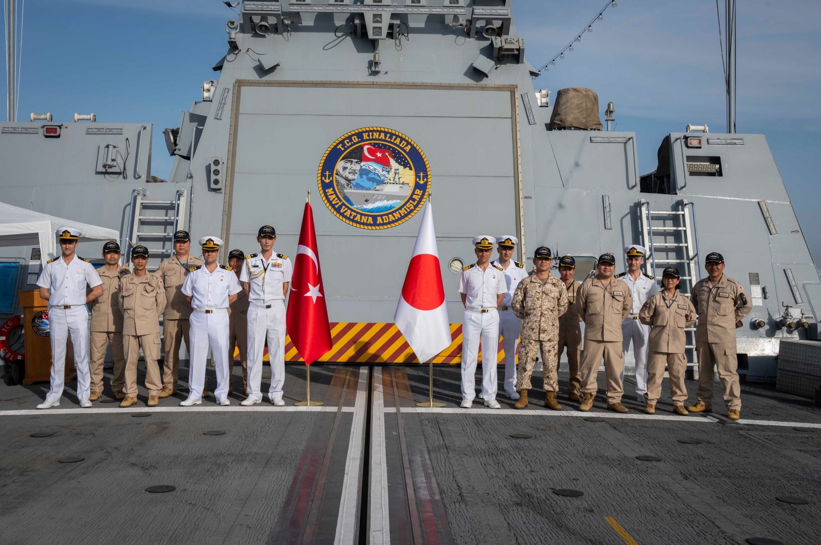 Turkish crew and soldiers from a Japanese base pose aboard TCG Kınalıada, Djibouti, April 20, 2024. (AA Photo)