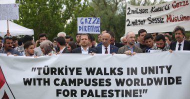 Protesters hold a banner in the Uludağ University in Bursa on Friday, May 4, 2024. (AA Photo)