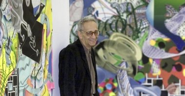 U.S. artist Frank Stella stands between his collages &quot;The Marchioness of O...&quot; (L), and &quot;The Engagement in St. Domingo&quot; at the Wuerttembergischer Kunstverein, Stuttgart, Germany, Sept. 20, 2001. (AP Photo)