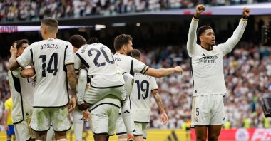 Real Madrid's (R) Jude Bellingham celebrates scoring his team's second goal during the La Liga match against Cadiz at the Santiago Bernabeu stadium, Madrid, Spain, May 4, 2024. (AFP Photo)