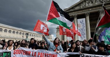 People wave Palestinian flags during an action by students of several universities in support of Palestinian people in Paris, France, May 2, 2024. (AFP Photo)