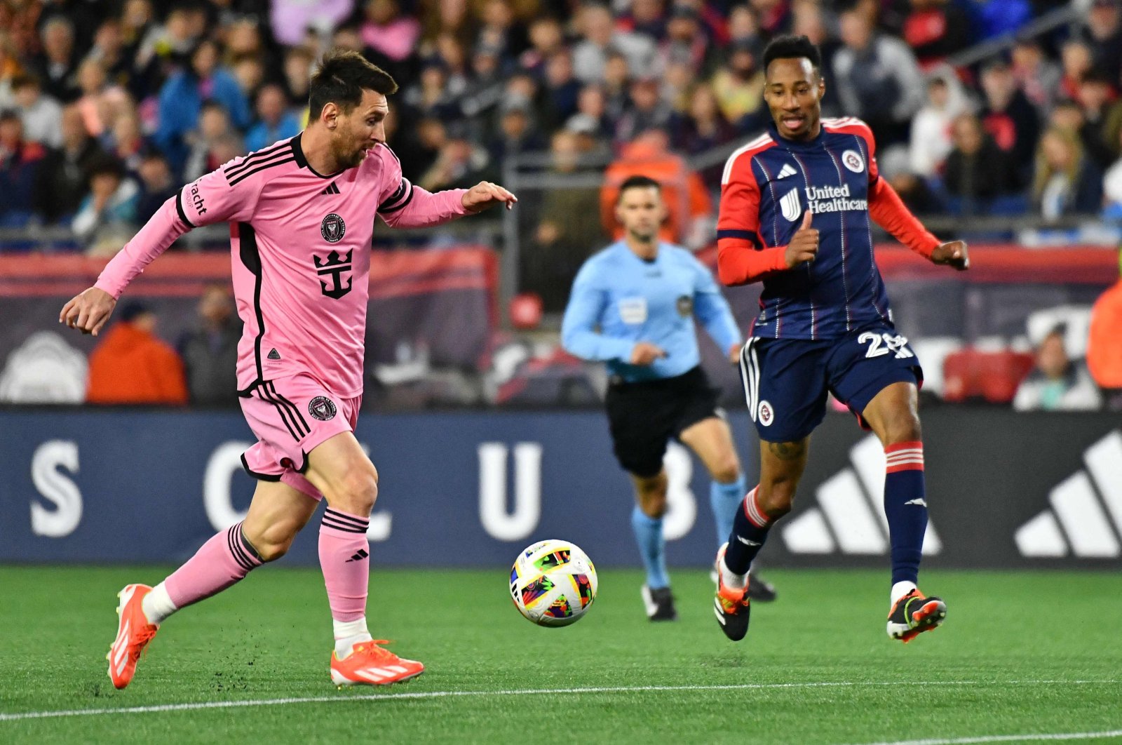 Inter Miami&#039;s Lionel Messi (L) fights for the ball with New England Revolution&#039;s Mark-Anthony Kaye during the Major League Soccer (MLS) match at Gillette Stadium, Foxborough, Massachusetts, U.S., April 27, 2024. (AFP Photo)