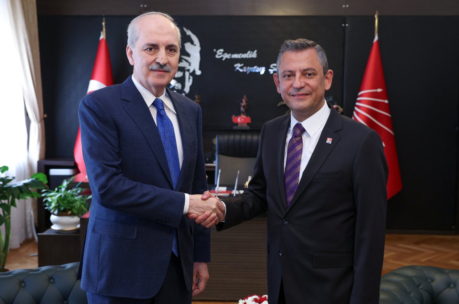 Parliament Speaker Numan Kurtulmuş (L) and Republican People&#039;s Party (CHP) Chair Özgür Özel (R) pose for a picture ahead of their meeting at Parliament, Ankara, Türkiye, April 30, 2024. (AA Photo)