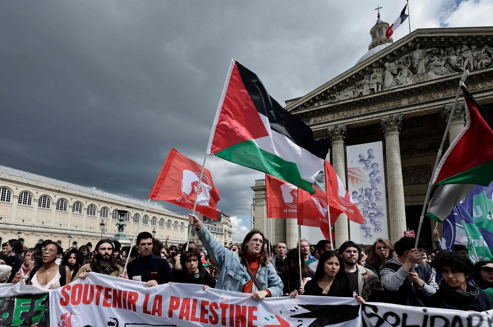 People wave Palestinian flags during an action by students of several universities in support of Palestinian people in Paris, France, May 2, 2024. (AFP Photo)