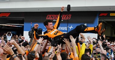 McLaren&#039;s Lando Norris is tossed in the air as his team celebrates his victory in the 2024 Miami Formula One Grand Prix at Miami International Autodrome, Miami Gardens, Florida, U.S., May 5, 2024. (AFP Photo)