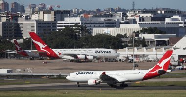 Qantas planes are seen at Kingsford Smith International Airport, Sydney, Australia, March 18, 2020. (Reuters Photo)