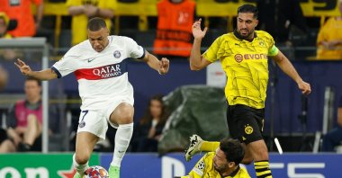 (L-R) Paris Saint-Germain&#039;s Kylian Mbappe, Dortmund&#039;s Mats Hummels and Emre Can vie for the ball during the UEFA Champions League semifinal first leg football match, Dortmund, Germany, May 1, 2024. (AFP Photo)