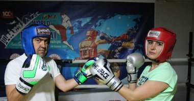 Bora Taştan (L) and his wife Gül Taştan pose for photo as they train for the World Cup, Sivas, Türkiye, May  6, 2024. (IHA Photo)