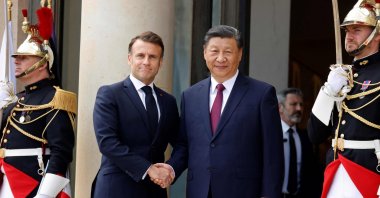 France's President Emmanuel Macron (L) greets Chinese President Xi Jinping at The Elysee Presidential Palace in Paris, France, May 6, 2024. (AFP Photo)