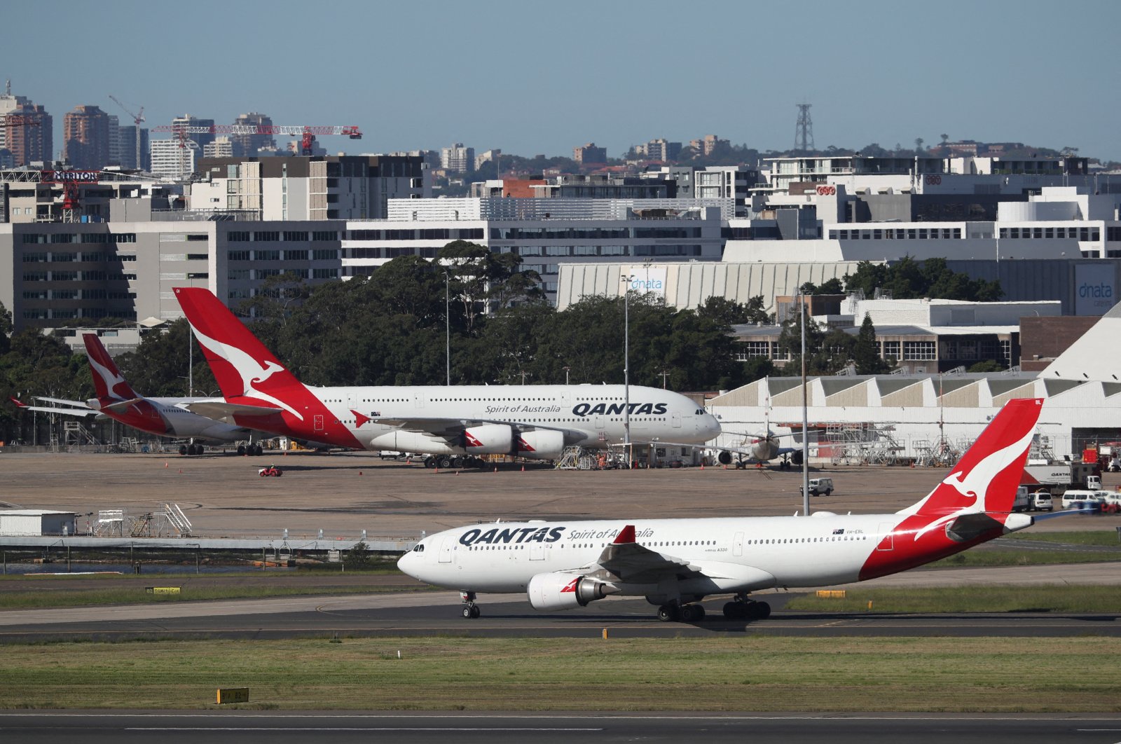 Qantas planes are seen at Kingsford Smith International Airport, Sydney, Australia, March 18, 2020. (Reuters Photo)
