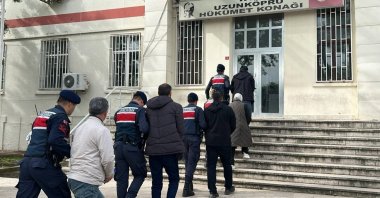 Turkish gendarmerie officers escort to a government office five FETÖ suspects caught while trying to flee the country in the northwestern Edirne province, Türkiye, May 5, 2024. (DHA Photo)