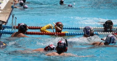 Turkish underwater hockey team players in action during a training session, Adana, Türkiye, May 7, 2024. (AA Photo)