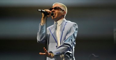 U.S.-Rapper Macklemore (of former duo Macklemore  Ryan Lewis) performs on stage at OVO ARENA Wembley, London, U.K., April 12, 2023. (Shutterstock Photo)