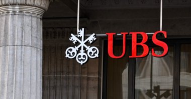 A sign and logo of the Swiss giant banking UBS is seen in Lausanne, Switzerland, Feb. 6, 2024. (AFP Photo)