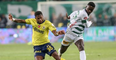 Fenerbahçe's Fred (L) and Konyaspor's Emmanuel Boateng vie for the ball during the Süper Lig match at the Medaş Konya Büyükşehir Stadium, Konya, Türkiye, May 6, 2024. (AA Photo)