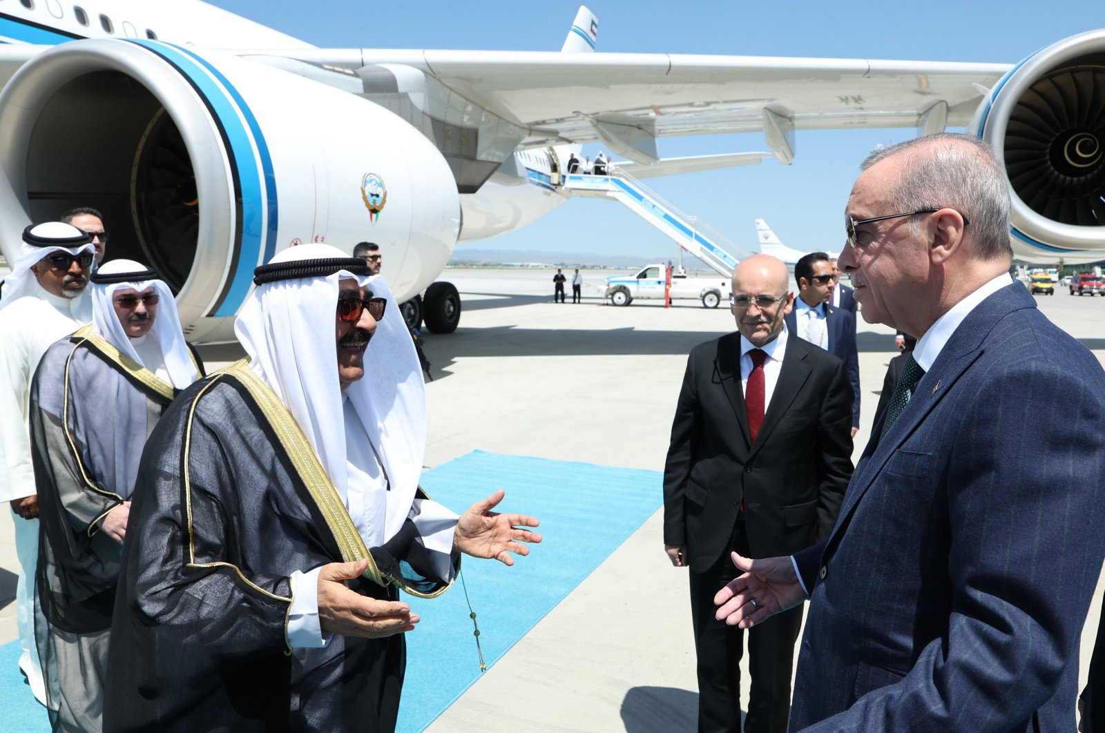 President Recep Tayyip Erdoğan (R) welcomes Sheikh Mishal Al Ahmad Al Sabah at Esenboğa Airport, in the capital, Ankara, Türkiye, May 7, 2024. (AA Photo)